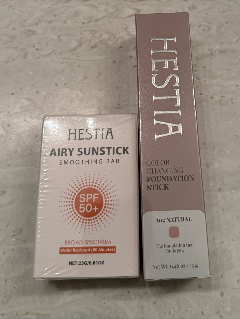 Hestia color changing foundation stick and Airy Hydrating sunscreen stick